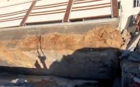 YIKILMADI ,TEMELİYLE YAN YATTI